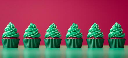Festive cupcakes row smooth frosting red green colors, minimalistic Christmas style. New Year. photo