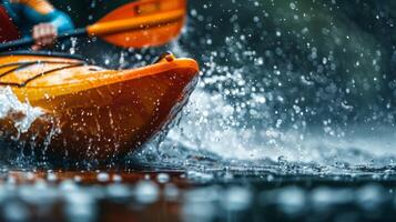 Close up of a kayaker in full speed during a sprint race, with water splashing. Focus on the kayak photo