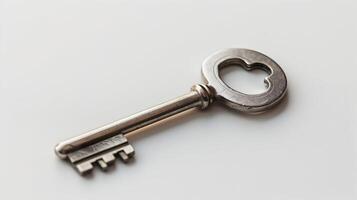 A minimalist modern key on a white background, with soft shadows emphasizing the key's sleek and contemporary design photo