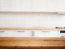 Wood table for food display with blurred kitchen photo