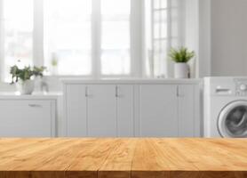 Wood table for display products on background of blurred laundry room photo