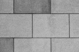 Brick stone wall texture background,Beautiful building decoration stone wall,raw stone floor for design or background,wide panorama of brick walls black and white,pattern texture background. photo