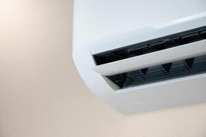 Air conditioning and system structure isolated in soft sunlight and cream white blurred background concept of electrical appliances and Inside the house for design. photo