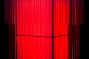 Neon red light on black shadow background, beautiful red light,Abstract background neon red light and line,glow lines,architecture lights,Beautiful lamp, warm colors, isolated background. photo