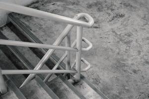 Close-up concrete stairs in a building or fire escape in a beautiful concrete pattern background. photo