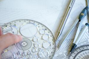 Design or drafting tool for engineers designing home construction and interior decoration and includes a pencil and a concept circle ruler for architectural concepts and planning. photo