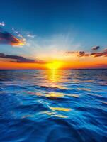 Breathtaking Sunset Over Calm Ocean Water With Golden Rays Reflecting On Surface. photo