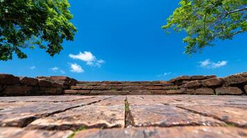 Stone Steps Leading Up To Blue Sky With Tree Branches Framing The View. photo