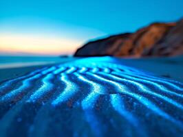 Blue Bioluminescent Sand Beach At Dusk. photo