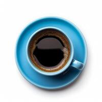 Top view of a freshly brewed coffee in a vibrant blue cup on a white background, evoking a refreshing summer morning routine photo