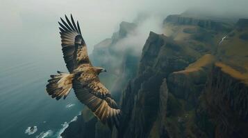 Majestic eagle soaring high above mountain peaks, wings fully spread photo