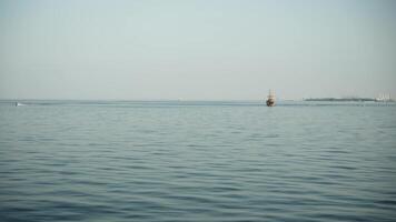 View of the open sea with a small ship video