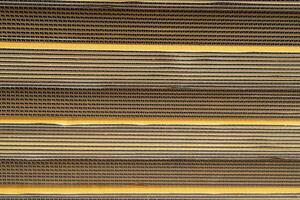 Cardboard, texture, background for graphics It is factory made cardboard waiting to be packed. photo