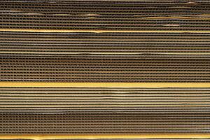 Cardboard, texture, background for graphics It is factory made cardboard waiting to be packed. photo