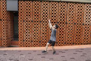 Men take a walk to relax after playing basketball in a public area, having fun and practicing at the same time. photo