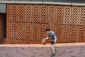 Men take a walk to relax after playing basketball in a public area, having fun and practicing at the same time. photo