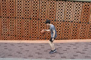 Men take a walk to relax after playing basketball in a public area, having fun and practicing at the same time. photo