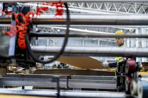 technician engineers checking the process on Heavy machine. mechanical engineering team production. Industry manufacturing. Worker holding tablet and folde. High technology production. photo