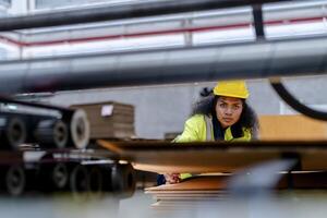 technician engineers checking the process on Heavy machine. mechanical engineering team production. Industry manufacturing. Worker holding tablet and folde. High technology production. photo