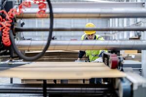 technician engineers checking the process on Heavy machine. mechanical engineering team production. Industry manufacturing. Worker holding tablet and folde. High technology production. photo