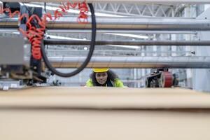 technician engineers checking the process on Heavy machine. mechanical engineering team production. Industry manufacturing. Worker holding tablet and folde. High technology production. photo