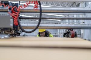 technician engineers checking the process on Heavy machine. mechanical engineering team production. Industry manufacturing. Worker holding tablet and folde. High technology production. photo