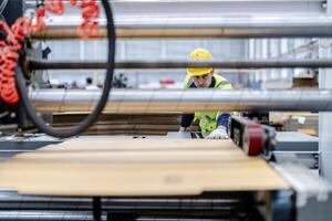 technician engineers checking the process on Heavy machine. mechanical engineering team production. Industry manufacturing. Worker holding tablet and folde. High technology production. photo