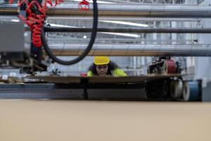 technician engineers checking the process on Heavy machine. mechanical engineering team production. Industry manufacturing. Worker holding tablet and folde. High technology production. photo