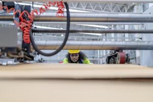 technician engineers checking the process on Heavy machine. mechanical engineering team production. Industry manufacturing. Worker holding tablet and folde. High technology production. photo