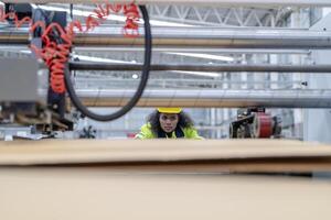 technician engineers checking the process on Heavy machine. mechanical engineering team production. Industry manufacturing. Worker holding tablet and folde. High technology production. photo