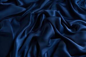 Blue sapphire color silk fabric background, top view. photo