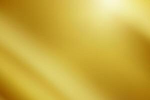 Abstract gold gredient metal color theme satin texture background. Lighting effects of flash. Blurred background with light glare. photo