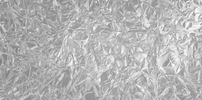 Silver Foil Texture Background with Smooth Metallic Surface and Light Reflections photo