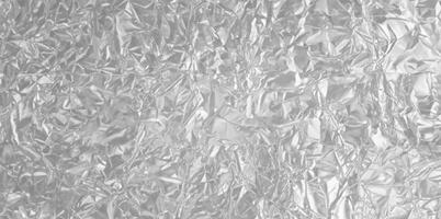 Silver Foil Texture Background with Smooth Metallic Surface and Light Reflections photo