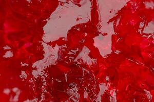Macro Shot of Fresh Strawberry Jelly Spread on White Surface photo