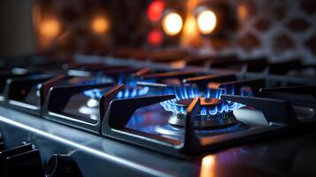 gas stove in modern kitchen with the flame photo