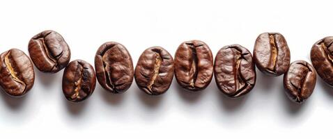Roasted Coffee Beans Scattered on White Background photo
