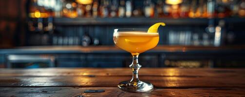 A Refreshing Cocktail on a Bar Counter With a Lemon Twist photo