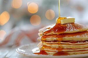 A Stack of Golden Brown Pancakes Drizzled With Syrup and Topped With Butter photo
