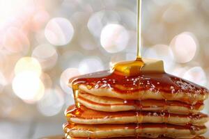 A Stack of Golden Brown Pancakes Drizzled With Syrup and Topped With Butter photo