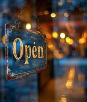 Rusty Open Sign Hanging in a Shop Window at Dusk photo