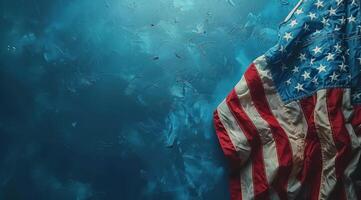 Faded American Flag Draped on Blue Background photo