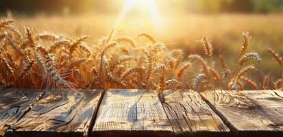Wooden Plank Surface With Golden Wheat Field and Sunset in Background photo