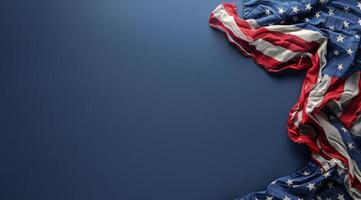 American Flag Draped Over Blue Background photo