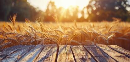 Wooden Plank Surface With Golden Wheat Field and Sunset in Background photo