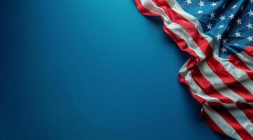 American Flag Draped Over Blue Background photo