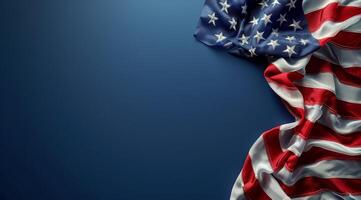 American Flag Draped Over Blue Background photo