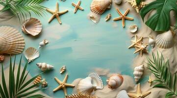 Seashells and Starfish on Blue Background With Palm Fronds and Sand photo