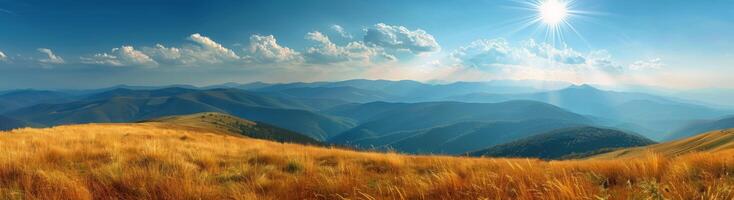 Sunny Day View Over Mountain Range With Golden Grass photo