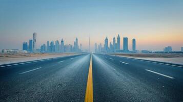 Empty Road Leading Towards A City Skyline During Sunrise photo